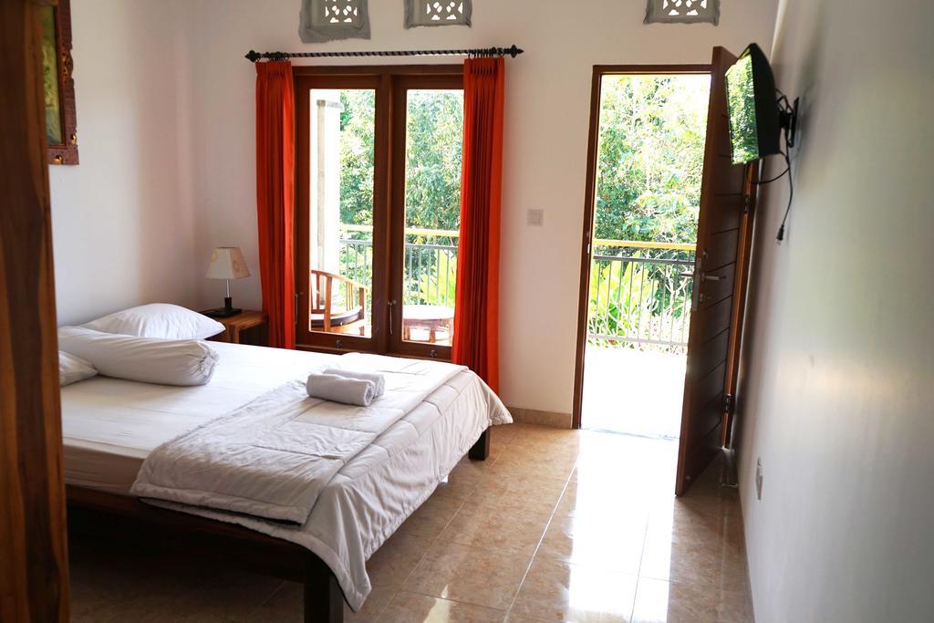 Uluwatu Made Guesthouse Esterno foto