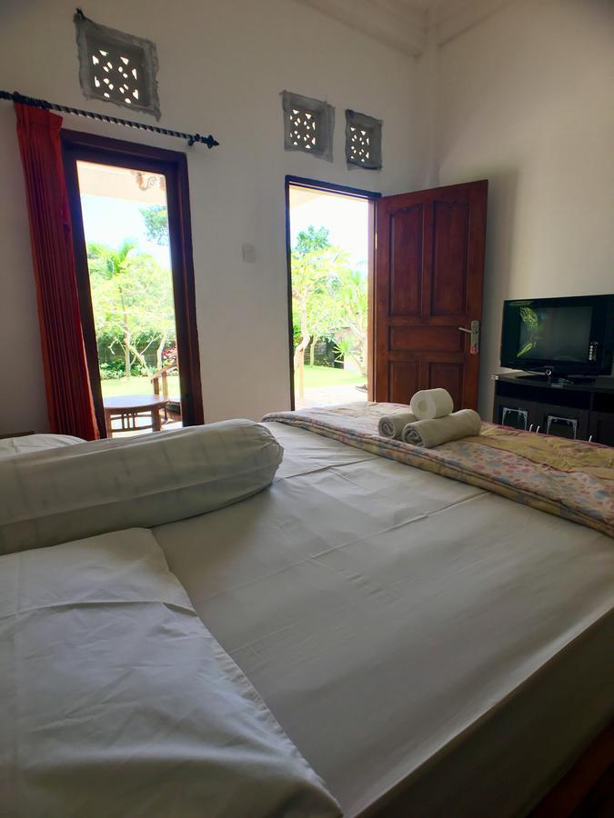 Uluwatu Made Guesthouse Esterno foto