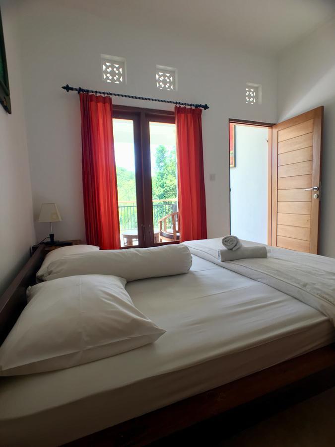 Uluwatu Made Guesthouse Esterno foto