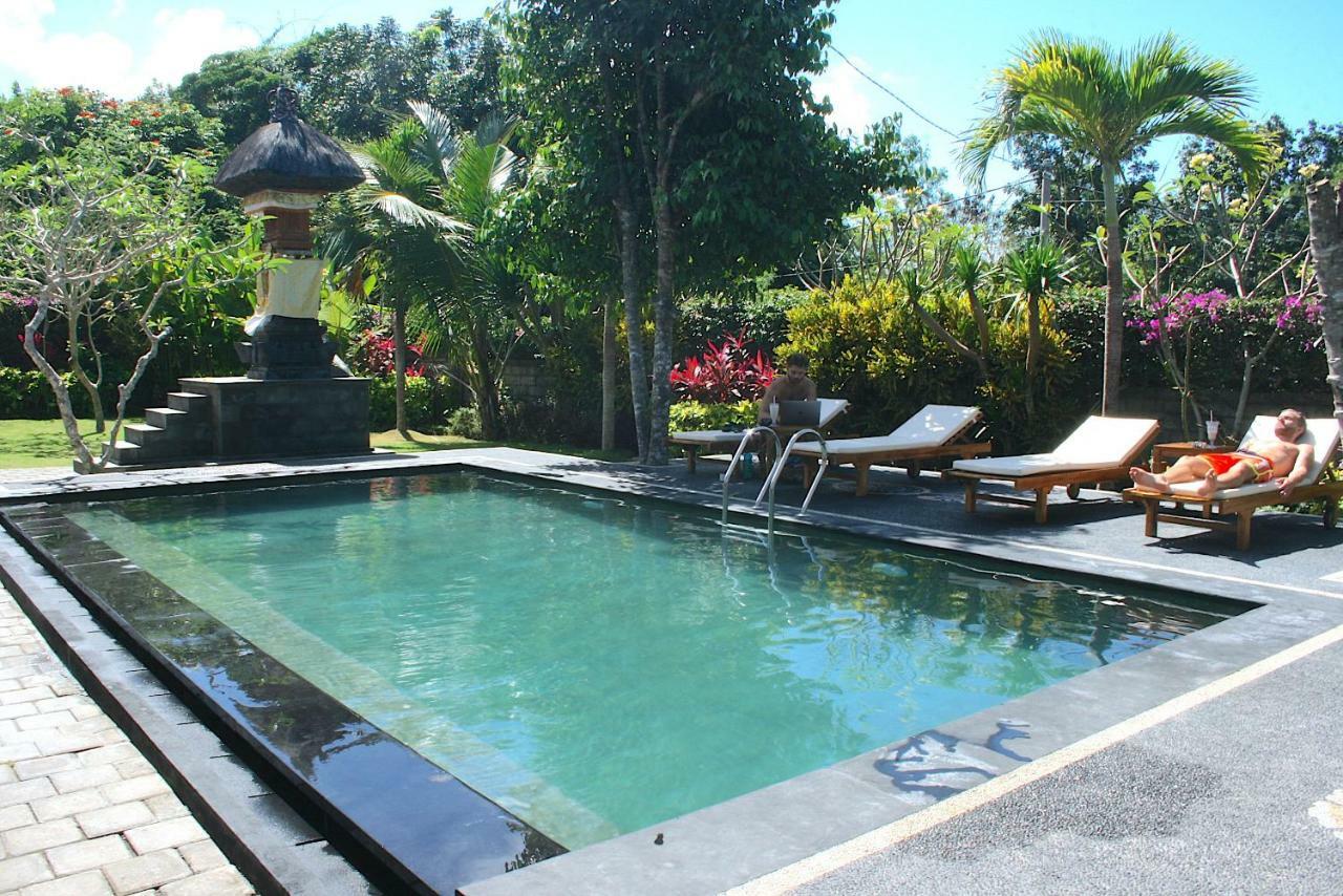 Uluwatu Made Guesthouse Esterno foto